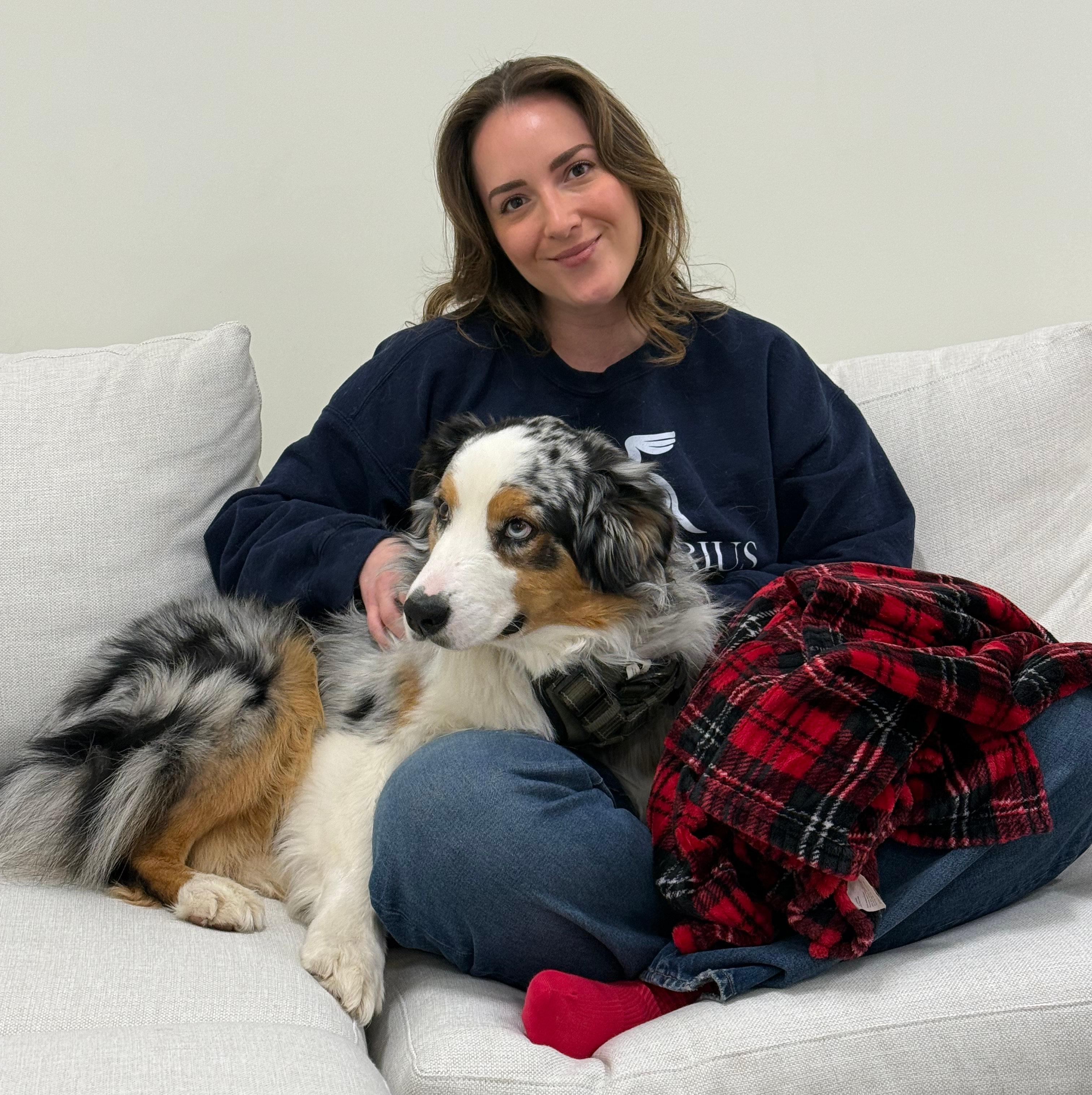 A Caladrius therapist with her dog at our Charlotte office